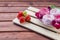 A close up of a plate with toasted meringues topped with berries ready for eating.Handmade marshmallow with strawberries