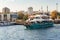 Close-up of a pleasure boat departs from the pier on coast of the Bosphorus in Istanbul. Bosphorus. Istanbul. Turkey. 09,25,2021