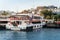 Close-up of a pleasure ship at the pier on the coast of Bosphorus in Istanbul. Bosphorus. Istanbul. Turkey. 09,25,2021