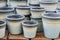 Close up of plenty empty clay flower pots for sale. Garden and interior decoration