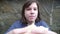 Close-up of plump brunette schoolboy looking around and biting sandwich. portrait of chubby overweight Caucasian boy