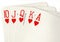 Close up of a poker hand of playing cards showing a royal flush.