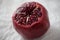 Close up of Pomegrate with Seeds Exposed on White background