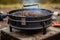 close-up of portable grill with char marks and smoky smell