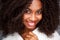 Close up portrait african american woman with curly hair wearing warm clothes