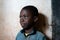 Close-up Portrait of African black Boy portrait inside of school classroom