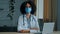 Close up portrait african woman in medical protective mask female doctor nurse therapist surgeon psychologist