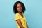 Close up portrait of attractive curly African girl looking at the camera.