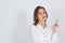 Close Up Portrait of Attractive Female Visagist Holding Eyebrow Tweezers on Her Hands and Posing on White Background in