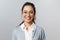 Close-up portrait of attractive, friendly-looking asian female office worker, employee or teacher in glasses, smiling