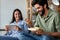 Close up portrait of an attractive married couple using digital tablet. Technology, people concept