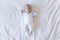 close up portrait of a beautiful baby on white background at home looking at the camera