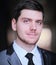 Close up.portrait of a beautiful businessman on a dark background