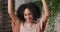 Close-up portrait beautiful millennial girl foreign student curly Afro American woman looking at camera learns good