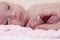 Close up portrait of a beautiful premature baby. Premature baby holding his mother`s hand