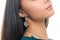 Close-up portrait beautiful woman with silver stylish earring is