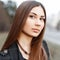 Close-up portrait of a beautiful young girl with amazing brown e