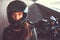 Close-up portrait of a biker girl inside the bridge.