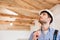 Close-up portrait of a builder examining his working place