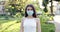 Close up portrait of a caucasian brunette in a protective medical mask on her face. The epidemic of influenza virus and