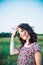 Close up Portrait of caucasian young woman or girl on green meadow enjoying nature summer. Calm and harmony. Nature rest. Summer