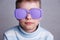 Close up portrait of cute boy in violet sunglasses with opaque l