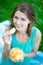 Close up portrait of cute woman eating potato chips