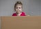 Close up portrait of emotional Little girl holding blank board