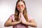 Close-up portrait of emotional young woman practising yoga