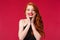 Close-up portrait of excited happy and surpirsed, cheerful gorgeous redhead woman with red lipstick, black dress