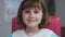 Close up portrait funny little child girl doctor. Happy adorable small preschool kid medic looking at camera. Cute kid