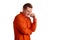 Close-up portrait of a ginger guy in orange shirt posing isolated on white background. Sincere emotions.