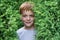 Close up portrait of a ginger smiling boy