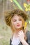 Close up portrait of a girl in a folk circlet of flowers