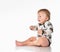 Close up portrait of a happy baby boy on a white background.