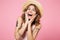 Close up portrait of a happy delighted girl in hat