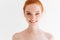 Close up portrait of happy naked ginger woman