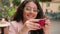 Close up portrait happy young smiling relaxed woman Indian Arabian ethnic female girl lady holding morning warm cup tea