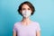 Close-up portrait of her she nice attractive brown-haired girl wearing safety reusable n95 mask flu flue grippe