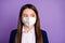 Close-up portrait of her she nice attractive long-haired schoolchild wearing n95 safety mask respirator mers cov