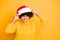 Close-up portrait of her she nice attractive mad angry unsatisfied evil wavy-haired girl putting santa outfit on