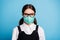 Close-up portrait of her she nice attractive serious conscious girl wearing reusable textile safe mask quarantine flu