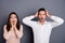 Close-up portrait of his he her she nice attractive terrified scared puzzled worried nervous couple wearing casual