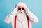 Close-up portrait of his he nice attractive funky amazed wondered white-haired Santa touching specs unexpected