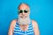 Close-up portrait of his he nice attractive funky cheerful cheery glad gray-haired man spending leisure pool party