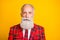 Close-up portrait of his he nice attractive serious imposing gray-haired man wearing checked blazer newyear party