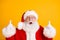 Close-up portrait of his he nice cheerful cheery funny glad white-haired Santa demonstrating look idea up copy space ad