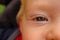 Close up portrait of a infant child with grey eye