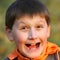 Close-up portrait of joyful boy