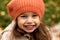 Close Up Portrait Of Little Cute Preschool Minor Girl In Orange Beret On Yellow Fallen Leaves Nice Smiling Looking At